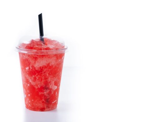 Red strawberry slushie isolated on white background Red strawberry slushie isolated on white background